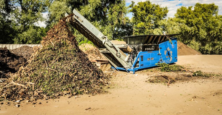 A Forus twin-shaft slow speed shredder working on green wood waste (photo courtesy Eggersmann Group).