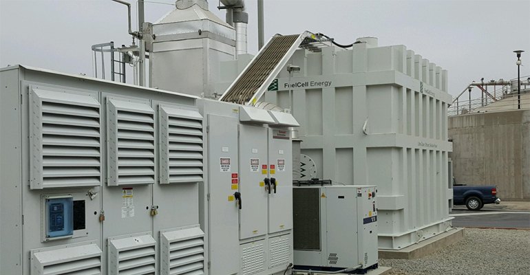 FuelCell Energy power plant (foreground) and anaerobic digester (background) at Riverside Regional Water Quality Control Plant, Riverside, California (photo courtesy FuelCell Energy).