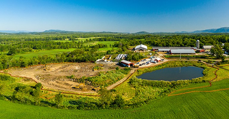 An overhead view of the Goodrich Family Farm in Salisbury, Vt., shows the digester construction site on the left on August 20, 2019 (photo courtesy Middlebury College).