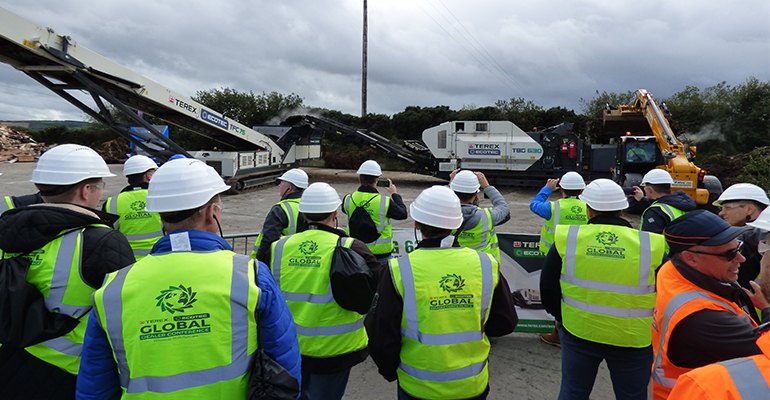 During the Terex Ecotec demo in Northern Ireland, green waste material was processed by the TBG 630 High-Speed Shredder (right), producing a high-quality end product ready for composting. This fed into the TFC 75 Organics Conveyor (left), which helped to further aerate the material with its auger system and efficiently create a large stockpile – saving on material handling costs (photo courtesy Terex Ecotec).